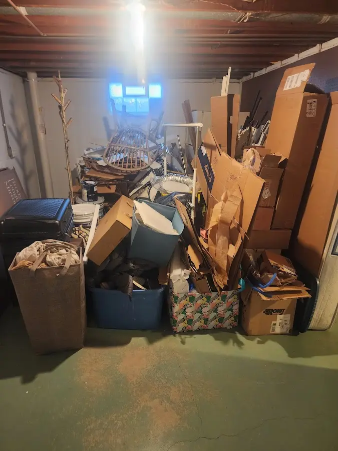 Roll-off dumpster container at job site for Yard Waste Dumpster Rental in Niles